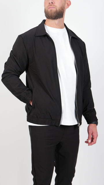 AURA • CHAQUETA • NEGRA